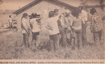Tribal citizens and supporters gathered to sing a final victory song prior to taking down the Blockhouse